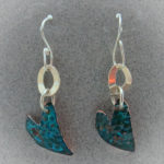 heart shaped metal earrings with blue patina