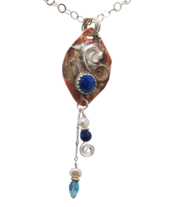 lapis gemstone pendant in copper and silver